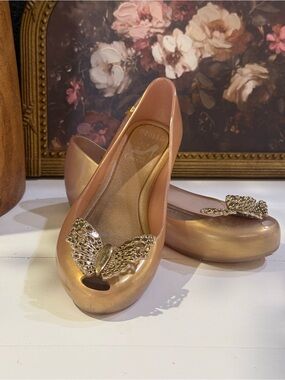Melissa Rose Gold Ballet Flats with Gold Butterfly Accent
